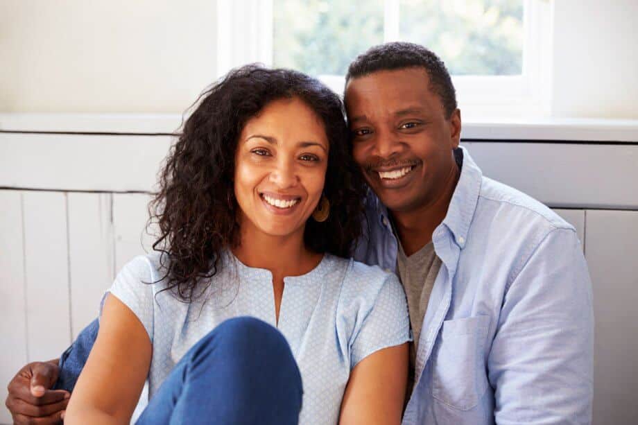 Couple smiling dental implants 920x613