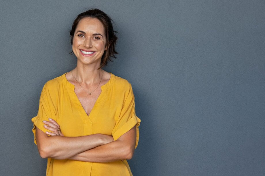 Woman smiling dental bridges 920x613